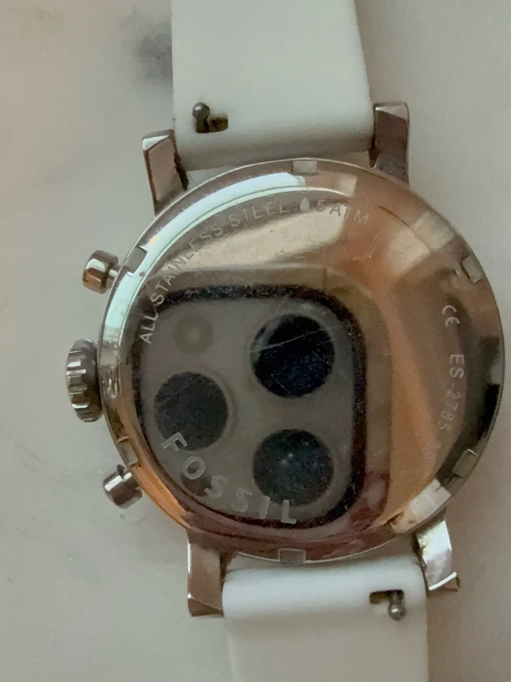 Fossil Silver Dial and White Silicone Strap Chronograph Watch